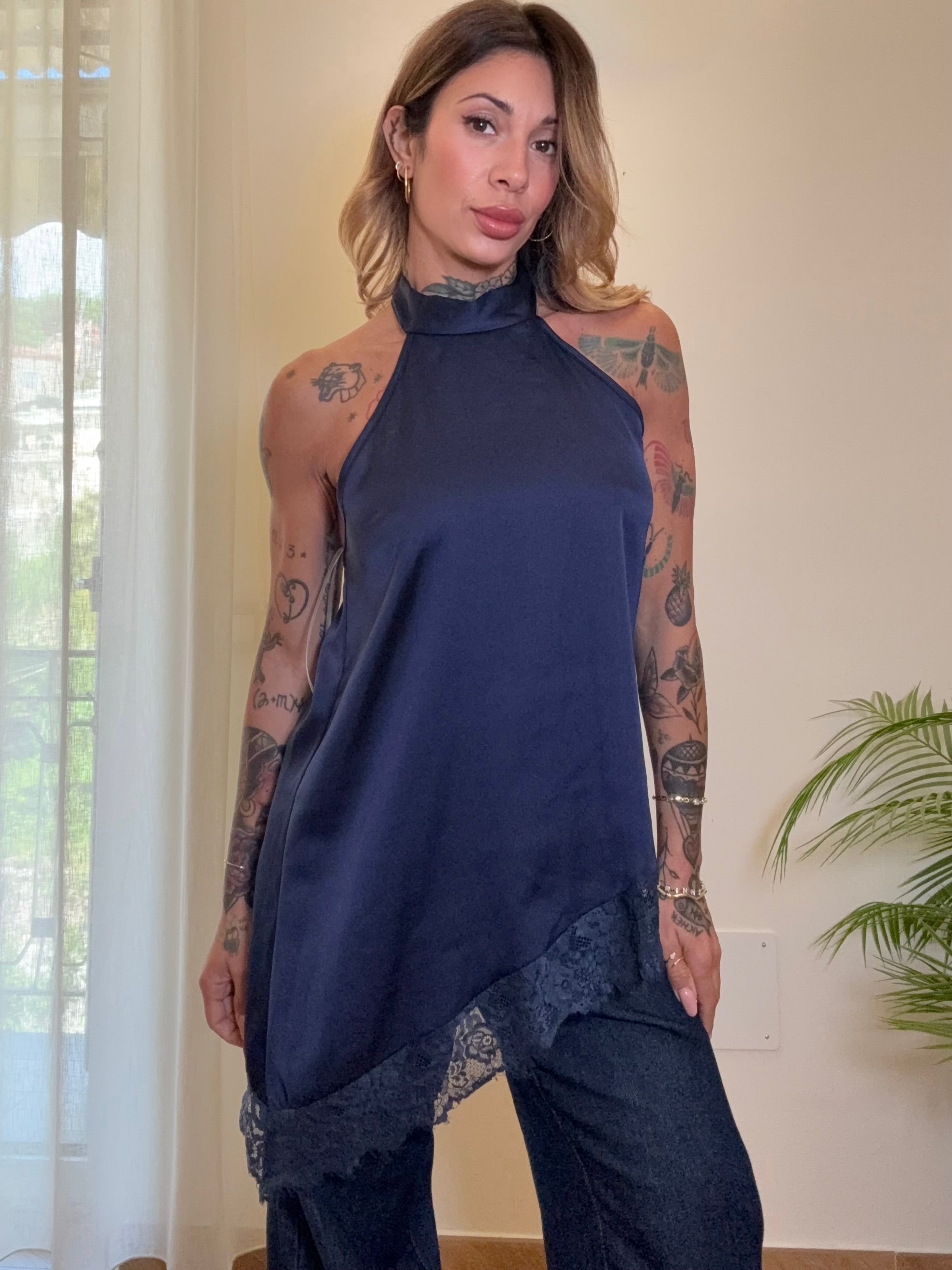 top asimmetrico raso